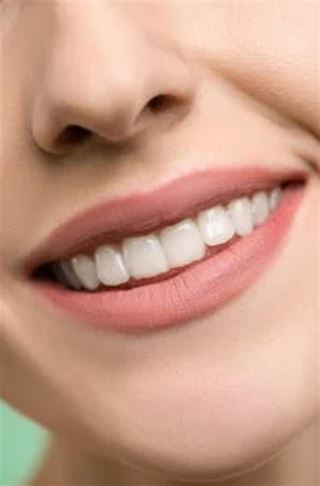 Hvordan man får det perfekte smil med invisalign